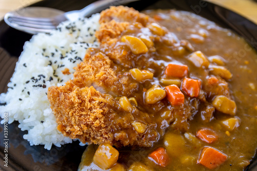 Japanese tonkatsu or fried pork curry with Japanese rice. photo