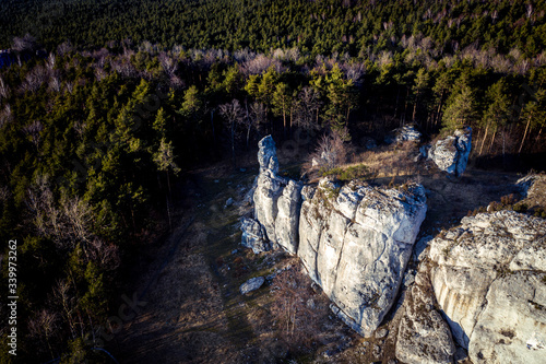 Top down view/ Aerial view over limestone rocks on the Mountain Kołoczek in Podlesice (Upland Cracow - Czestochowa, Wyzyna Krakowsko - Czestochowska), popular tourist place. During sunny early spring 
