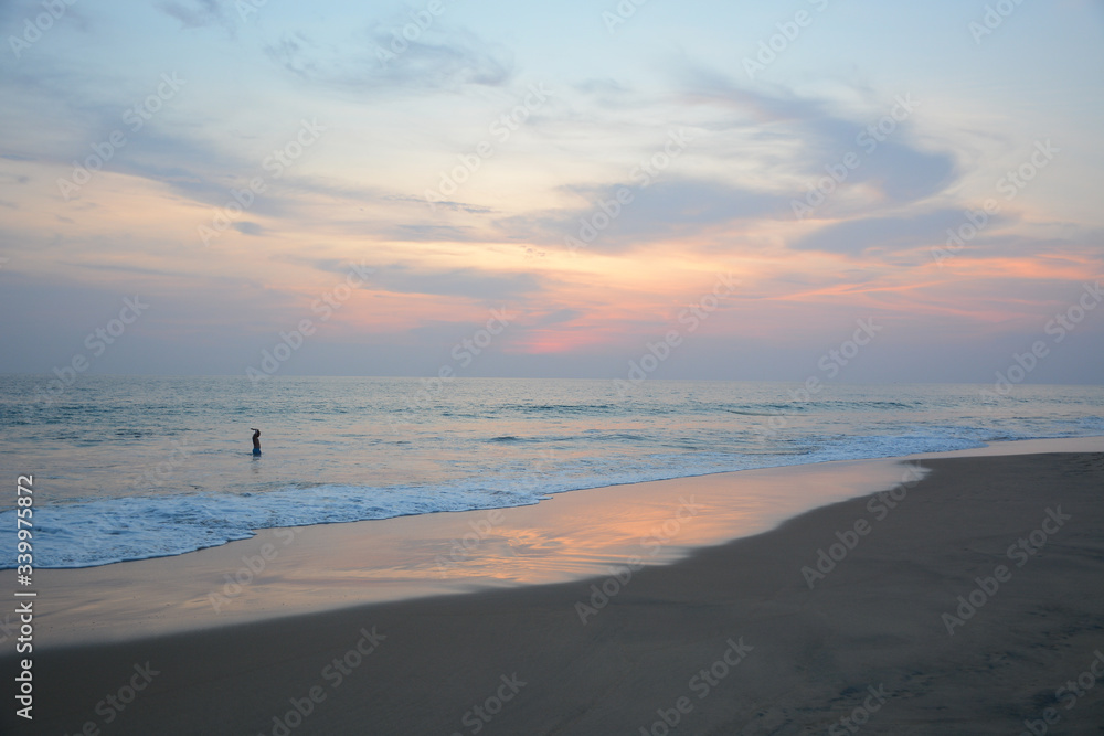 Hikkaduwa, Sri Lanka - March 11, 2019: View from Hikkaduwa Beach to Indian ocean during the sunset Hikkaduwa, Sri Lanka - March 11, 2019: View from Hikkaduwa Beach to Indian ocean during the sunset