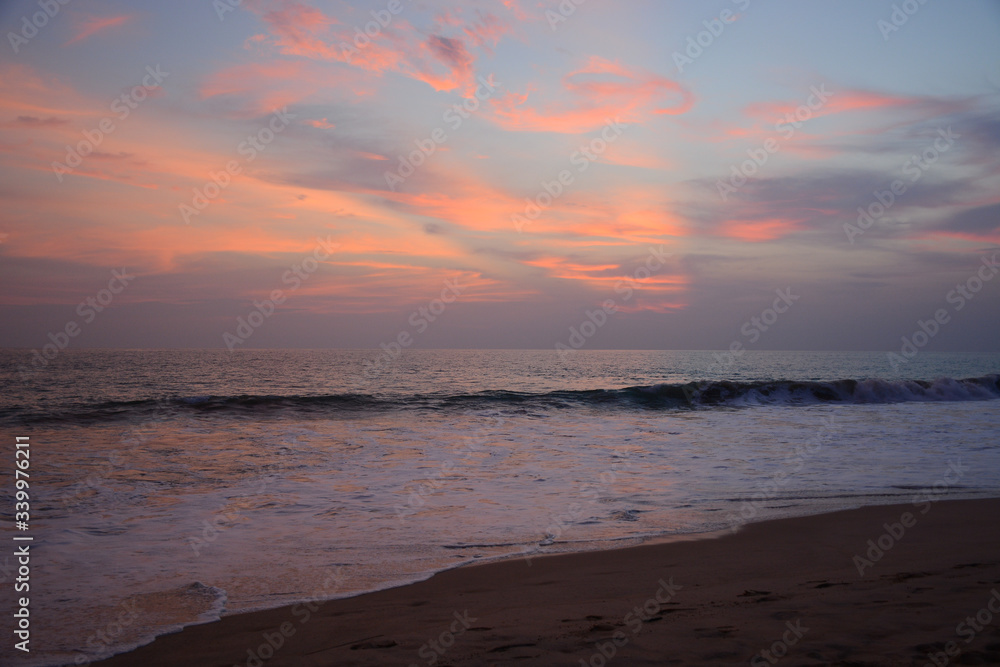 Hikkaduwa, Sri Lanka - March 11, 2019: View from Hikkaduwa Beach to Indian ocean during the sunset