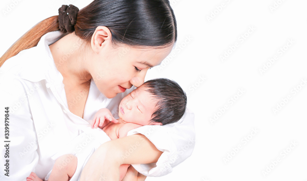 Mother day concept. The mother held the baby in her hand. Mom holding small baby. Woman hands holding newborn baby. Mother day concept. The mother held the baby in her hand. Mom holding small baby. Woman hands holding newborn baby.