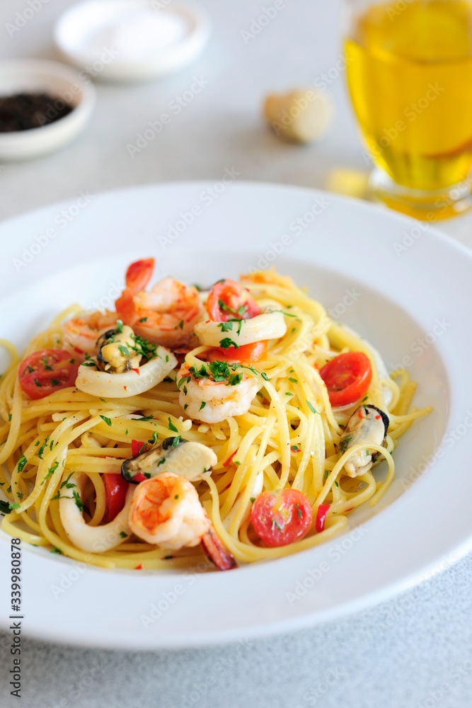 Tasty of Spaghetti with sea food on the plate - Close up. 