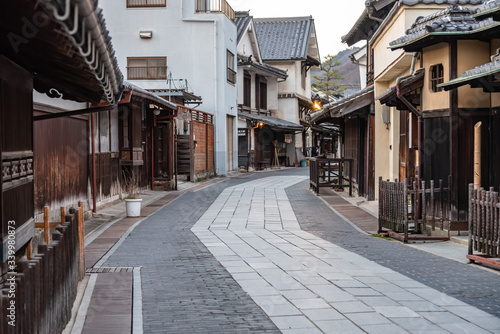 Takehara Townscape Conservation Area in dusk. The streets lined with old buildings from Edo, Meiji periods, a popular tourist attractions in Takehara city, Hiroshima Prefecture, Japan photo