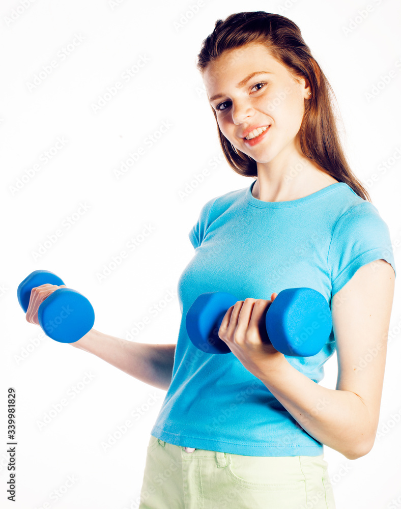 young pretty slim woman with dumbbell isolated on white background, cheerful smiling young pretty slim woman with dumbbell isolated on white background, cheerful smiling