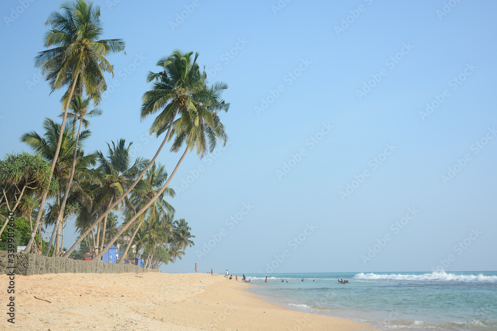 Hikkaduwa, Sri Lanka - March 11, 2019: Beautiful beach near Cool Beach Hotel Hikkaduwa, Sri Lanka - March 11, 2019: Beautiful beach near Cool Beach Hotel