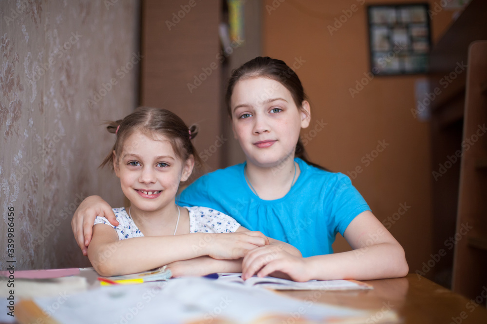 Portrait of two schoolgirls at home Portrait of two schoolgirls at home