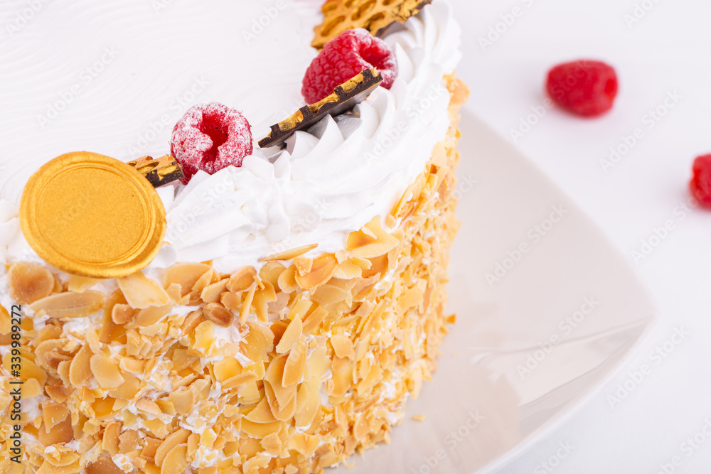 Air cake with nut chips of almonds with fresh raspberry and chocolate Air cake with nut chips of almonds with fresh raspberry and chocolate