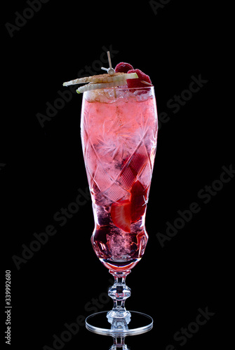 Refreshing cocktail raspberry, with berry strawberries and raspberries, with ice and decoration photo