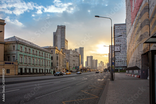 Russia, Moscow, April 2020. Empty streets of the city. Street New Arbat. A small number of cars. Quarantine in Moscow. Spring day, sunset. There are no people on the street at all.