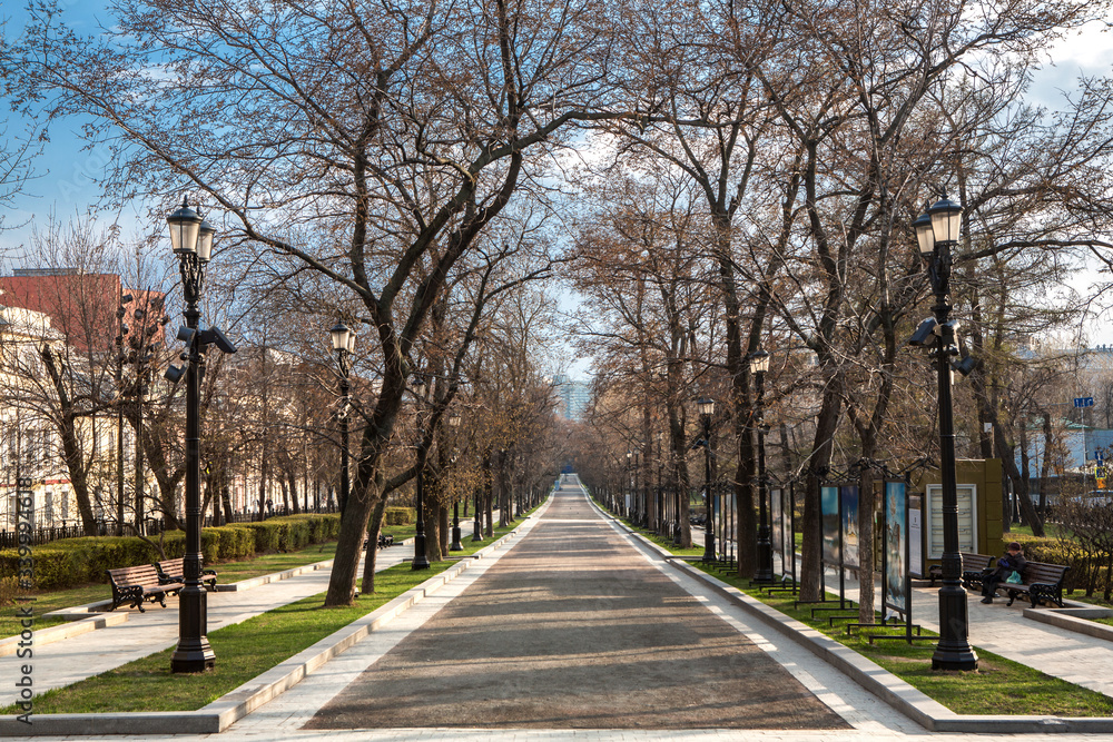 Park alley without people. Sunny spring day. Self-isolation in the city. Center of Moscow, Tverskaya Boulevard. Park alley without people. Sunny spring day. Self-isolation in the city. Center of Moscow, Tverskaya Boulevard.