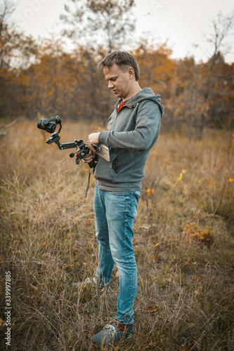 Cameraman Prepare Equipment For Shooting Video © Svyatoslav Lypynskyy