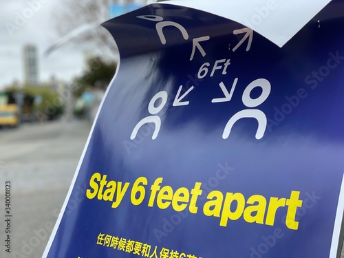 Coronavirus Sign Promoting Six Feet of Social Distancing in Public Spaces due to Covid-19 in San Francisco Bay Area California