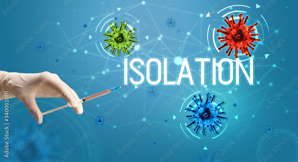 Syringe, medical injection in hand with ISOLATION inscription, coronavirus vaccine concept Syringe, medical injection in hand with ISOLATION inscription, coronavirus vaccine concept