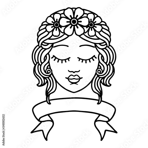 black linework tattoo with banner of female face with eyes closed