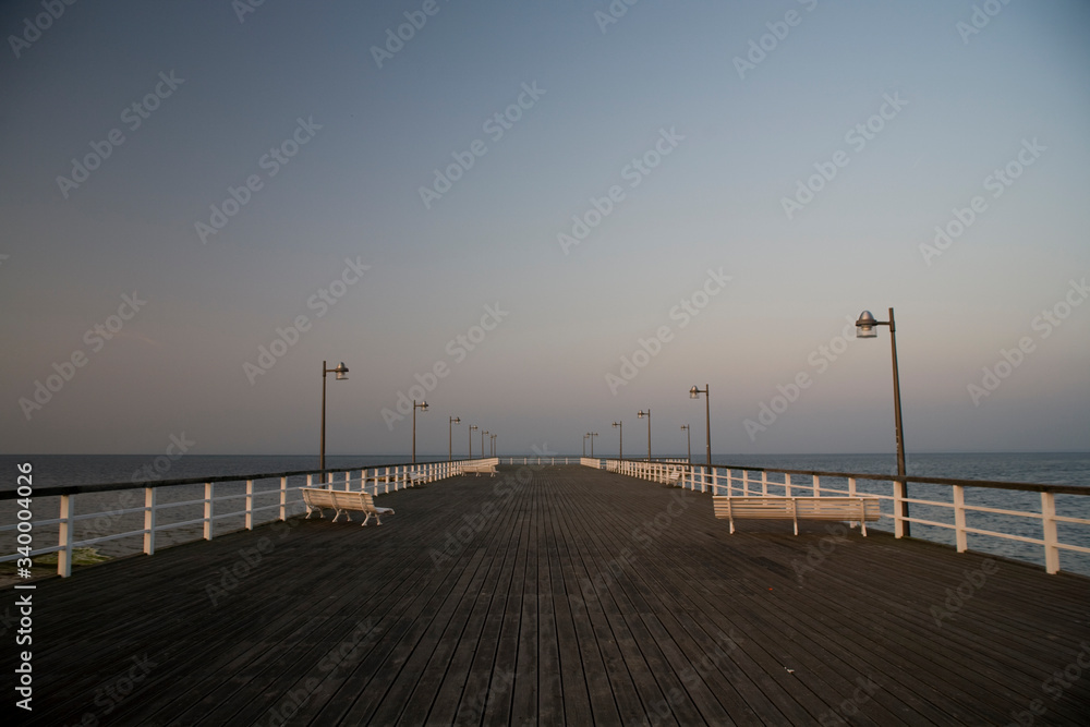  calm landscape with the sea and wooden sea without people on a sunny morning