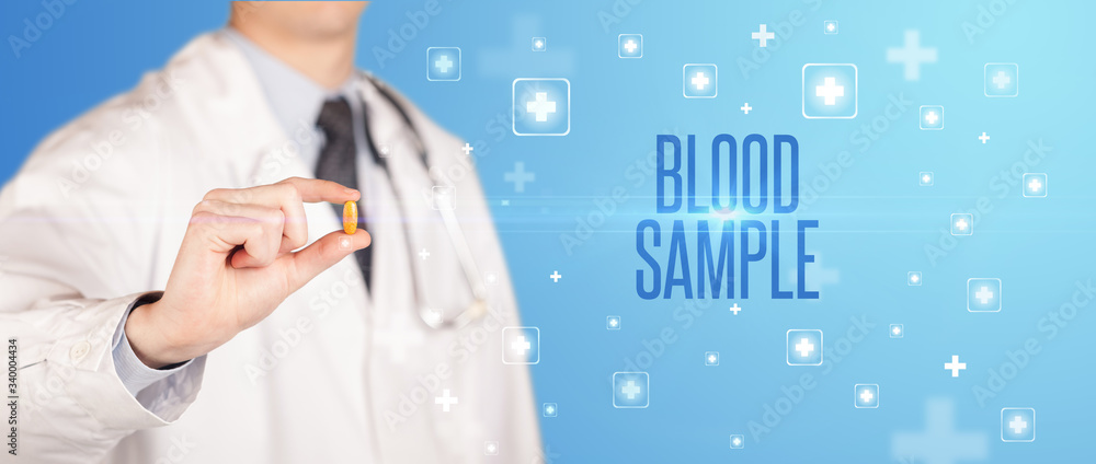 Close-up of a doctor giving a pill with BLOOD SAMPLE inscription, medical concept Close-up of a doctor giving a pill with BLOOD SAMPLE inscription, medical concept