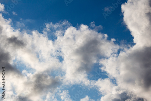 white clouds against blue sky