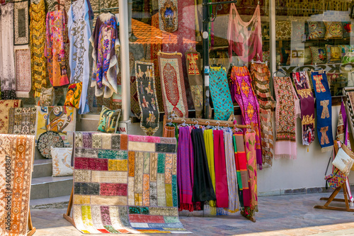 Local Clothes, Cushions & Rugs on display in the Antalya Old Town © Chantal Reed