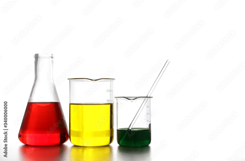 Experimental glassware Resting on a white table In the laboratory To research the treatment of coronavirus. Science Concepts, Education. white background. copy space Experimental glassware Resting on a white table In the laboratory To research the treatment of coronavirus. Science Concepts, Education. white background. copy space