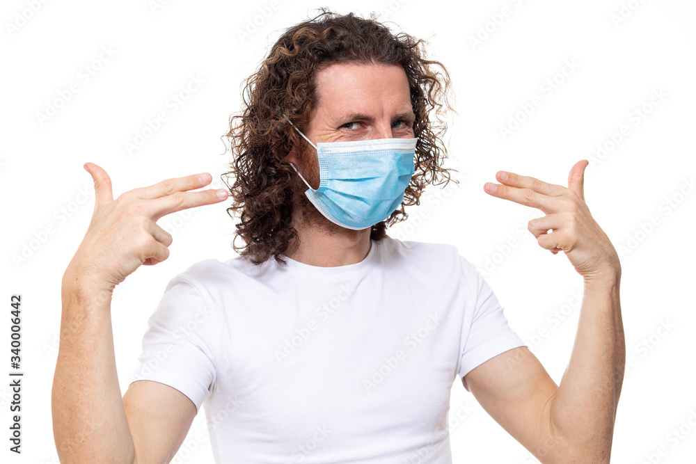 Man in medical mask. Pandemic coronavirus epidemic covid-19 quarantine isolated white Man in medical mask. Pandemic coronavirus epidemic covid-19 quarantine isolated white