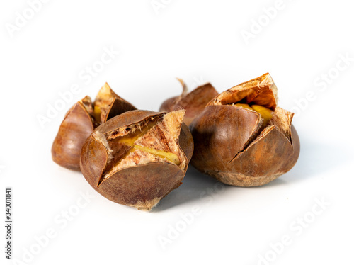 Baked or roasted chestnuts. Scored with an X on top. “Bread of the mountain”. Seed of the Castanea sativa or Chestnut tree. Use for sweet and savory recipes. Seasonal: late fall through winter.