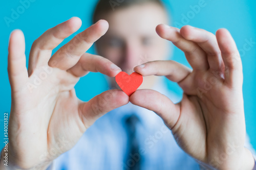 Hands holding an heart