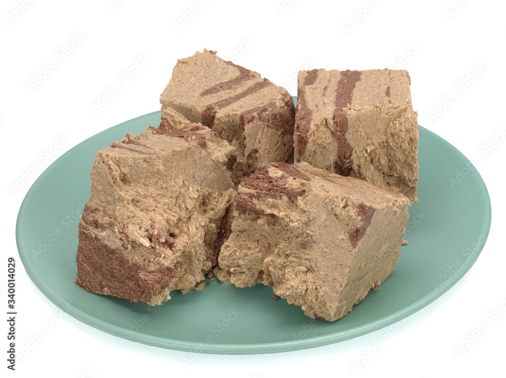 Halva in a plate on a White Background, top view Halva in a plate on a White Background, top view