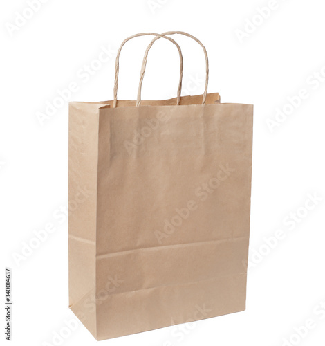 Eco-friendly paper bag made of recycled paper, isolate white background. Space for text or logo