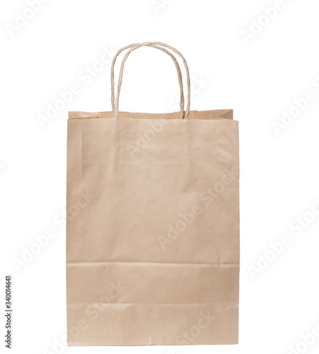 Eco-friendly paper bag made of recycled paper, isolate white background. Space for text or logo