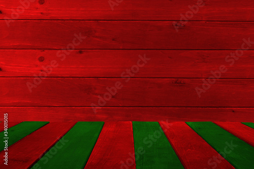 Empty display. Background and table of red and green wooden planks. Copy space for your text.