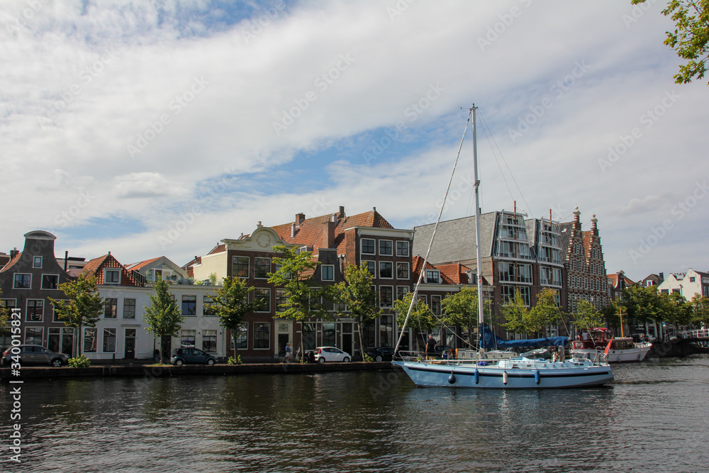 Haarlem canal with a sailing boat