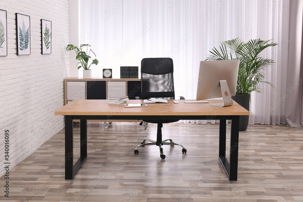 Director's office with large wooden table. Interior design