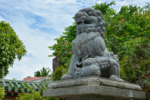 Stone sculpture of a Chinese dragon in the Assembly Hall of Fujian Chinese. Hoi An, Vietnam