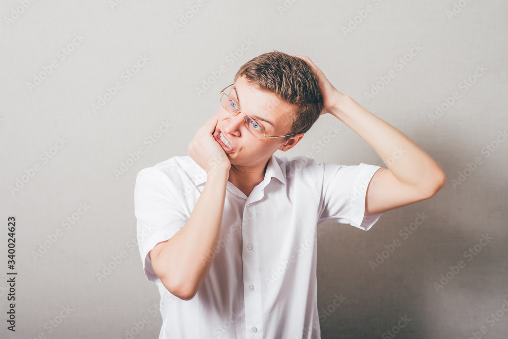 extremely shocked expressive guy with hands over his head extremely shocked expressive guy with hands over his head
