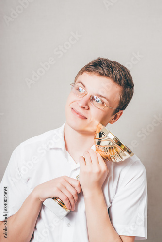 Happy businessman with a golden cup
