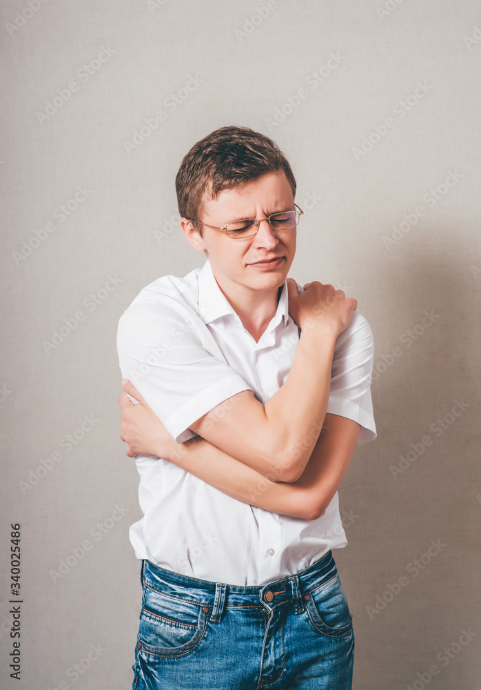 Young man with feeling cold Young man with feeling cold