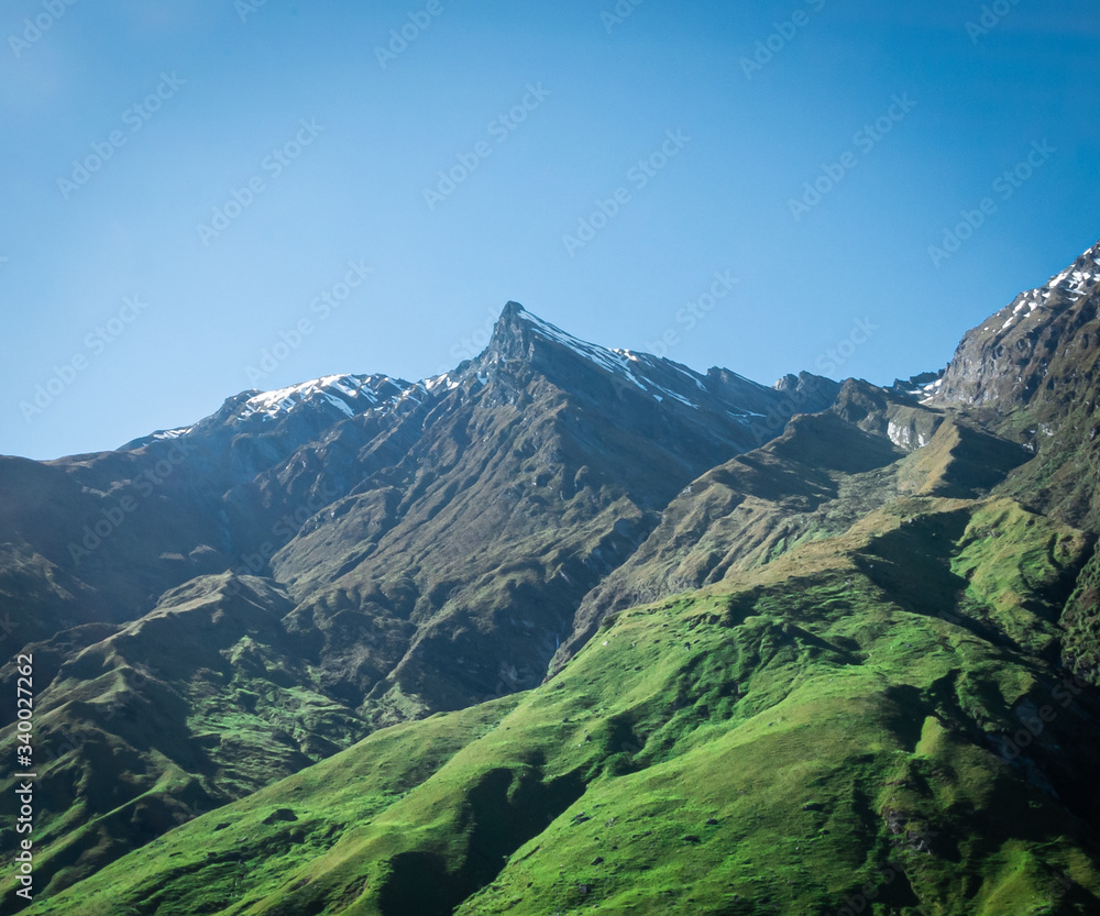 View on usually shaped mountain during sunny day, made on Rob Roy Glacier Track in New Zealand