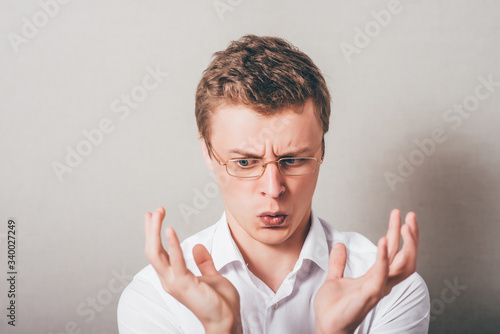 Businessman holding something on his palm