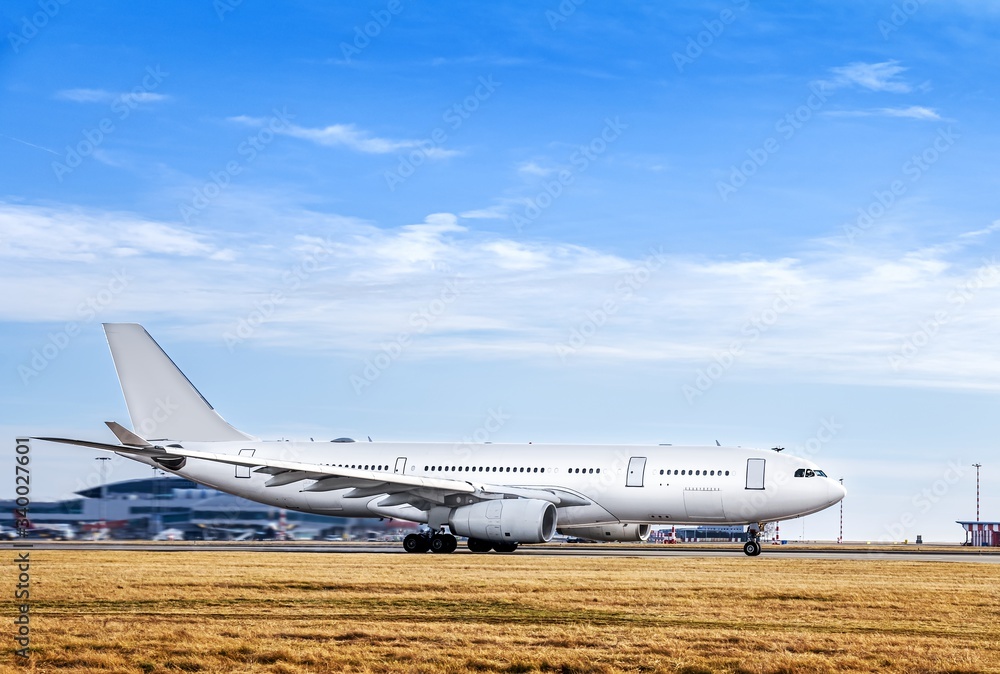 Aircraft take-off into the sky against the background of the airport . passenger traffic Aircraft take-off into the sky against the background of the airport . passenger traffic