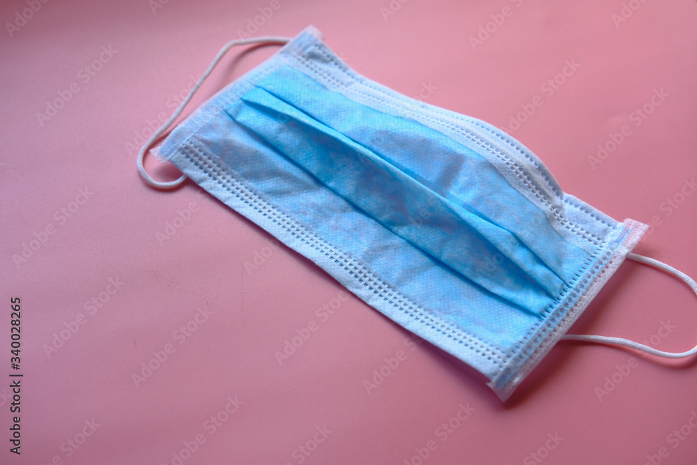 Medical mask i on pink background, Corona protection Medical mask i on pink background, Corona protection