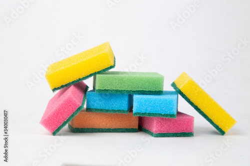 Colored sponges for washing dishes. Cleaning of the kitchen.