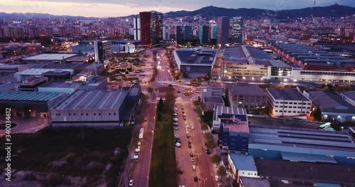 Aerial view of illuminated Plaza de Europa with modern conference center Fira Barcelona Gran Via photo