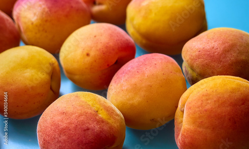 Ripe apricots on a background.