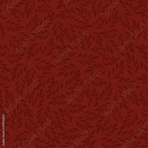 Floral seamless pattern with leaves on twigs. Vector illustration for fabric, wrapping paper, backgrounds, packaging. On a dark burgundy background.