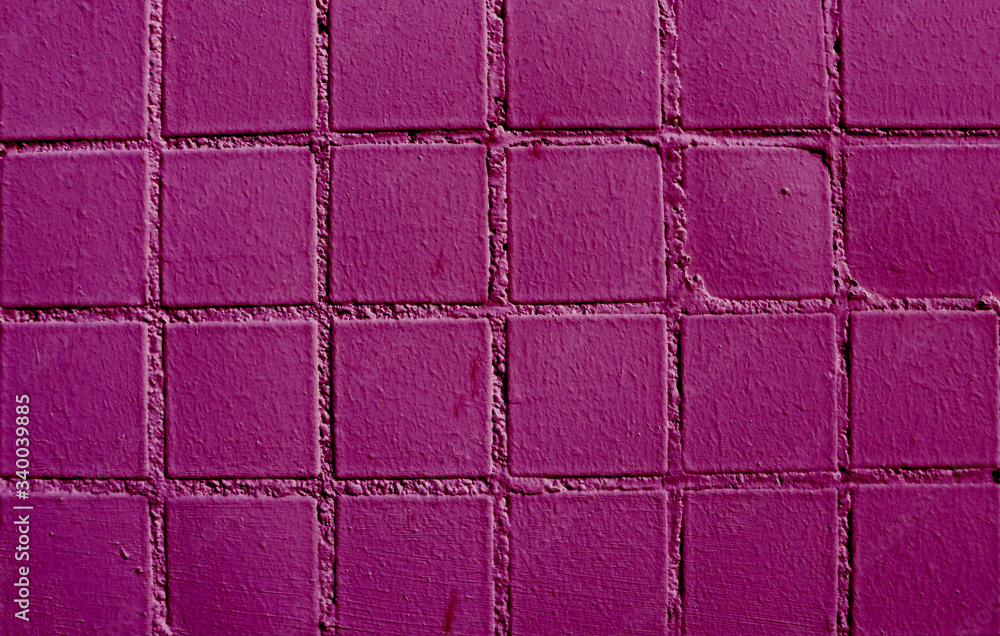 Background from little purple tiles. Texture of soft purple small square tiles