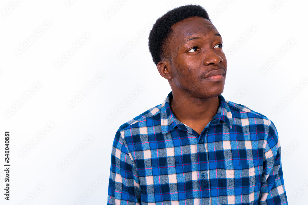 Young handsome African man against white background Young handsome African man against white background