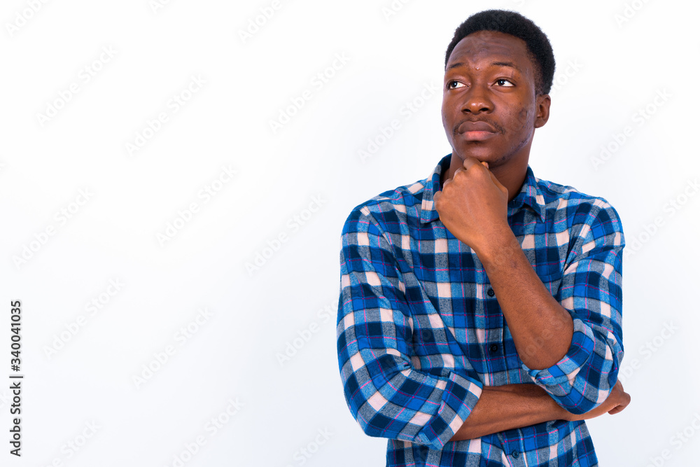 Young handsome African man against white background Young handsome African man against white background