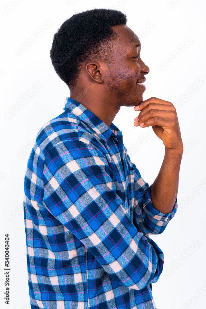 Young handsome African man against white background Young handsome African man against white background