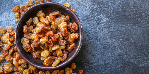 raisins, delicious dried grapes (fresh fruit vitamins) menu concept background. top view. copy space for text keto or paleo diet