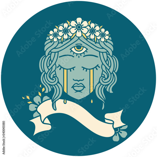 icon with banner of female face with third eye crying